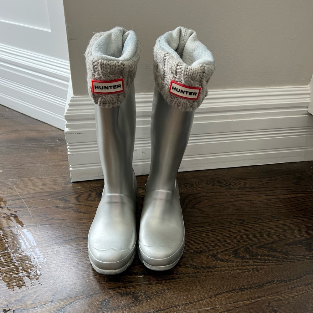 Hunter silver rain boots with light grey sock lines